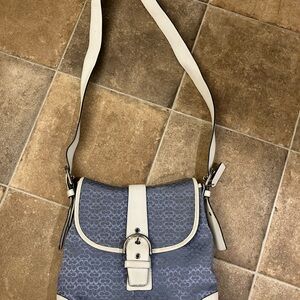Blue/cream coach cross body purse. Good used condition. Couple of small marks.